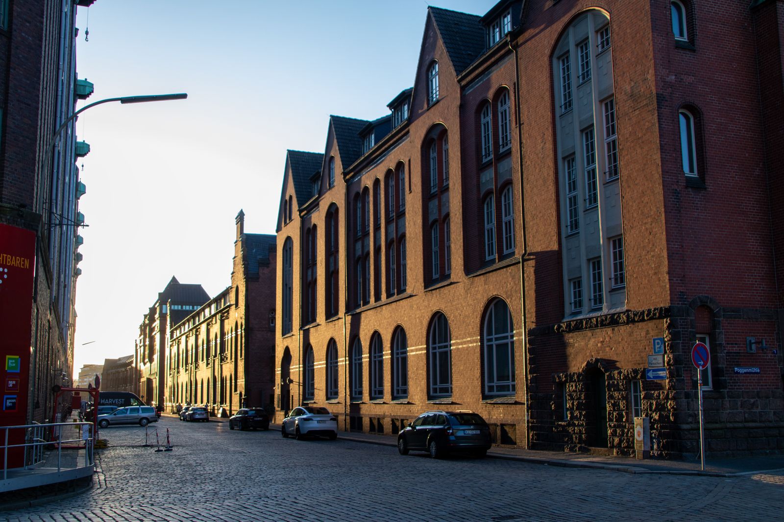 Evening view of the sunlit historical warehouse district in Hamburg, Germany.